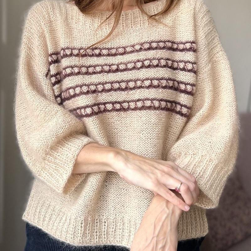 Вязаная спицами женственная блуза (платье) с полосой текстурного узора Lucia