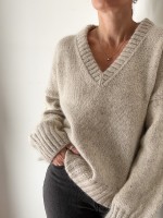 Стильный пуловер спицами описание