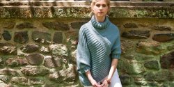 Асимметричный женский пуловер спицами