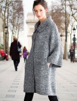 Свободное вязаное пальто спицами из Vogue осень 2015