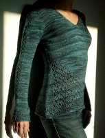 Женский пуловер с ажурными вставками