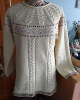 Пуловер с круглой кокеткой косами и орнаментом схема и описание